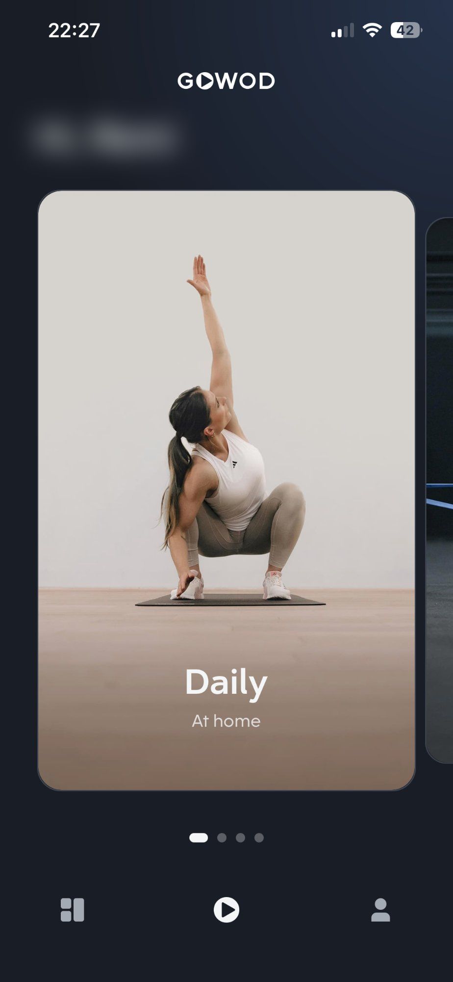 My GOWOD home screen showing the Daily mode with an athlete in a deep squat stretch